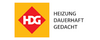 Logo der Firma HDG. Der Schriftzug "HEIZUNG DAUERHAFT GEDACHT" ist in einer klaren Schriftart dargestellt. Hintergrund in Gelb mit rotem, diamondförmigem Emblem.
